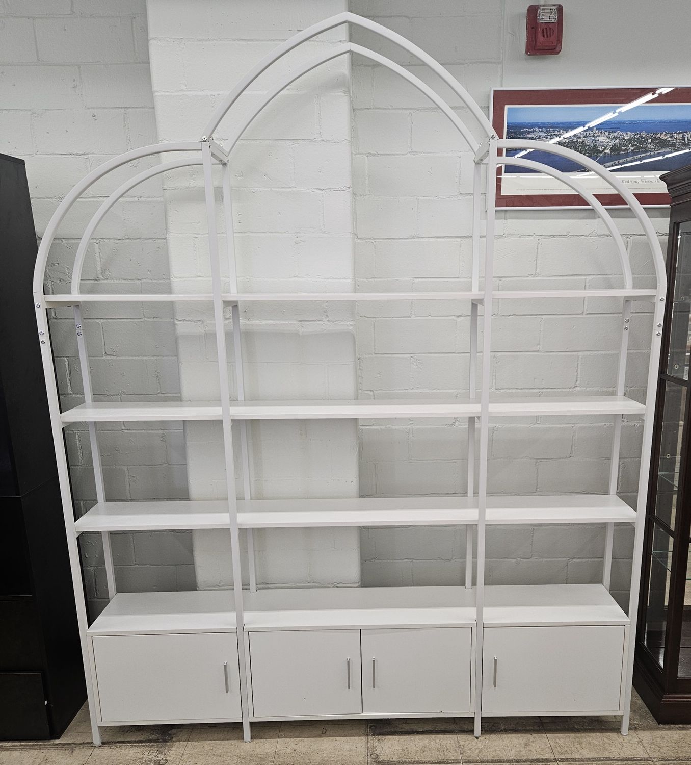 White metal and wood shelving unit