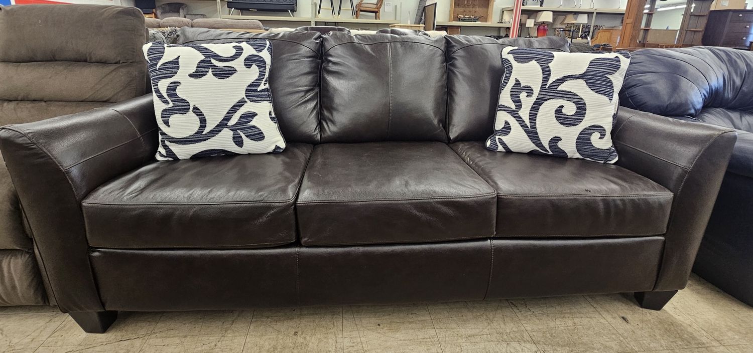 Sleek dark brown leather sofa