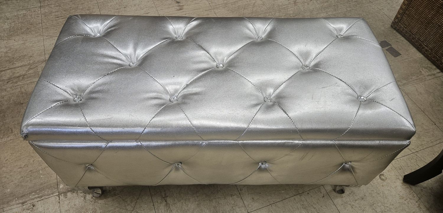 Glamorous silver storage ottoman!