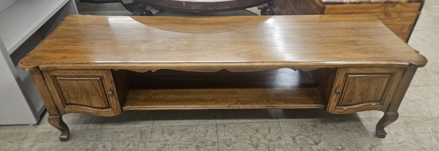Coffee table with charm and hidden storage
