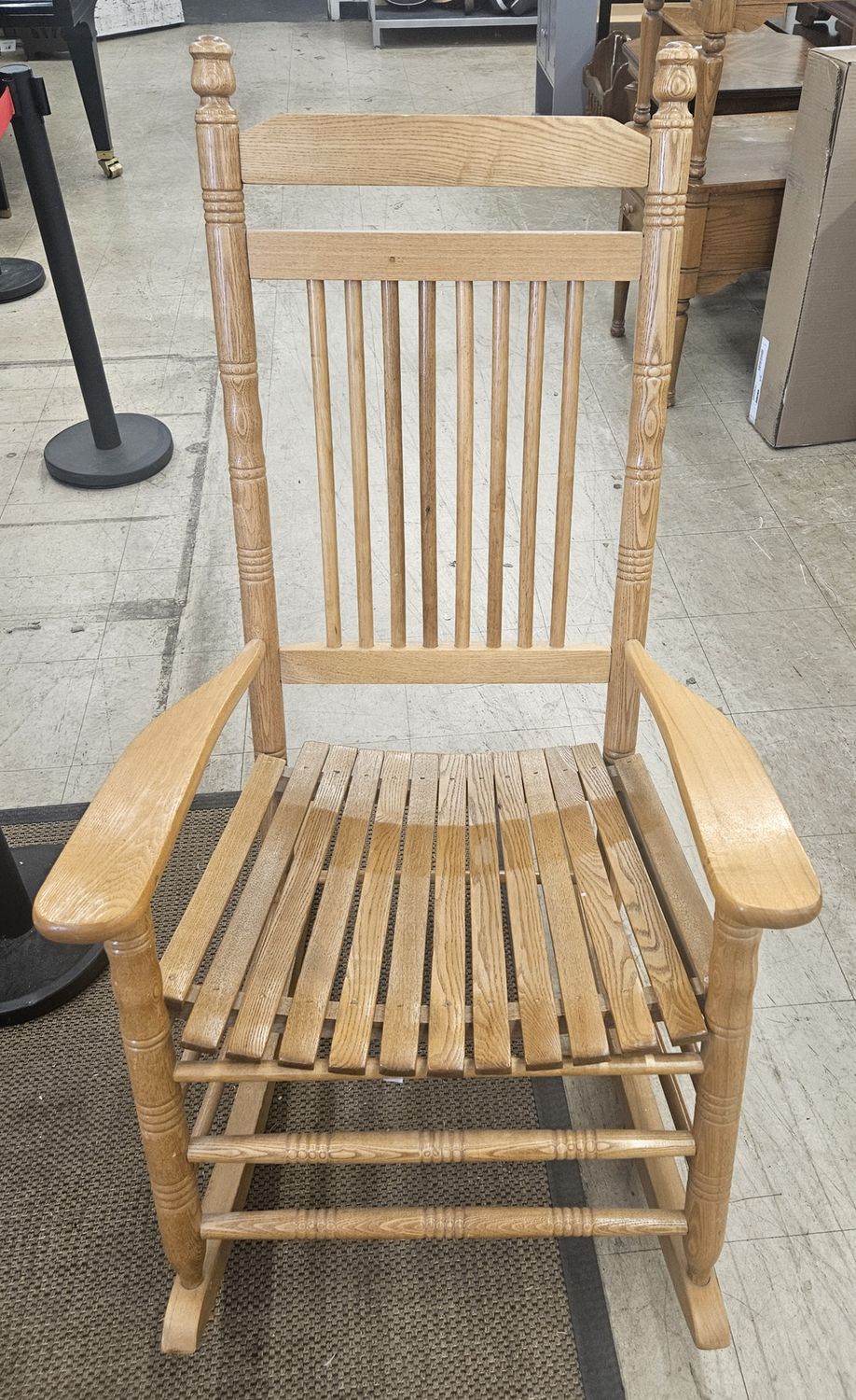 Solid wood rocking chair.
