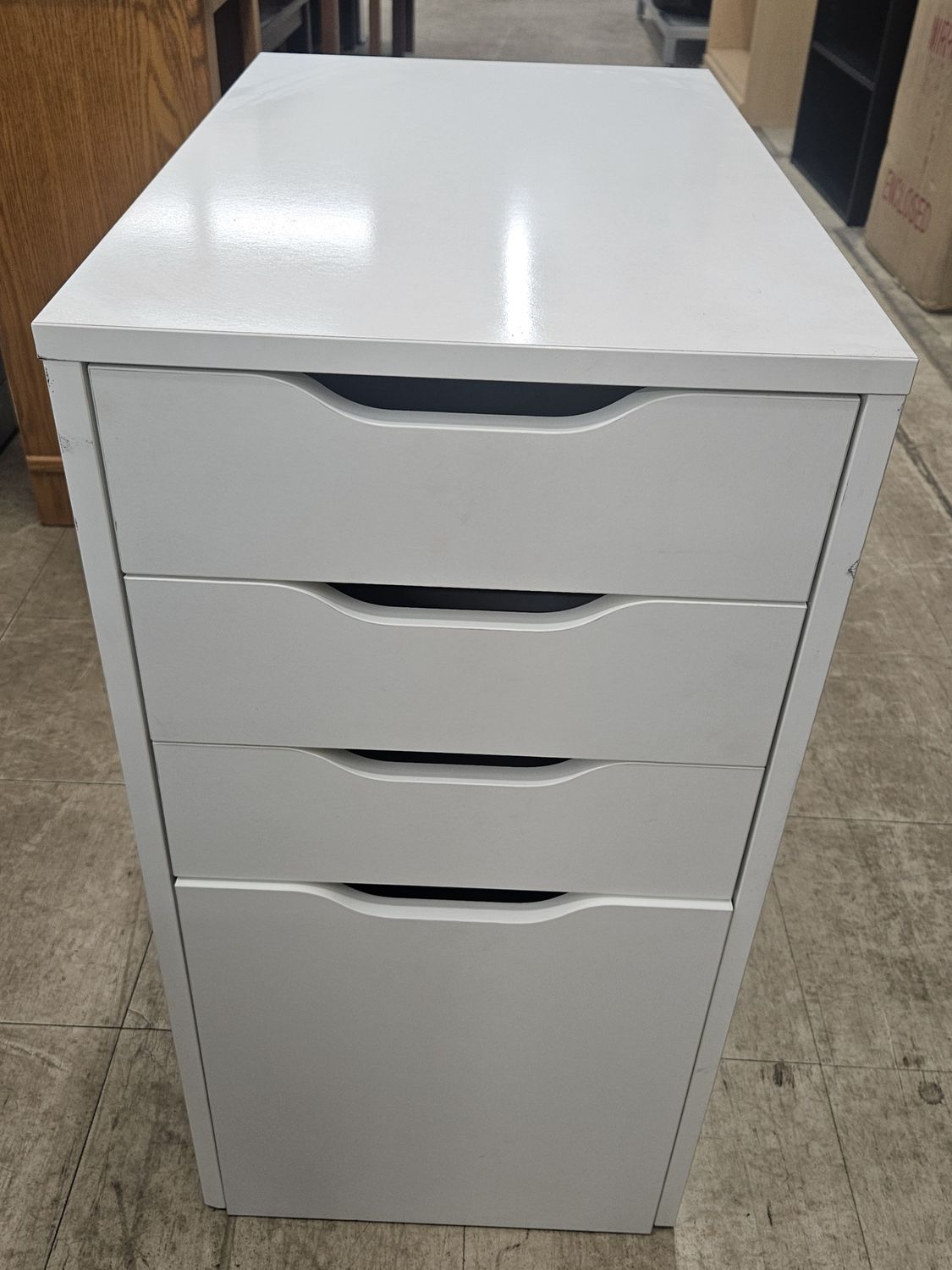 Sleek white 4-drawer cabinet