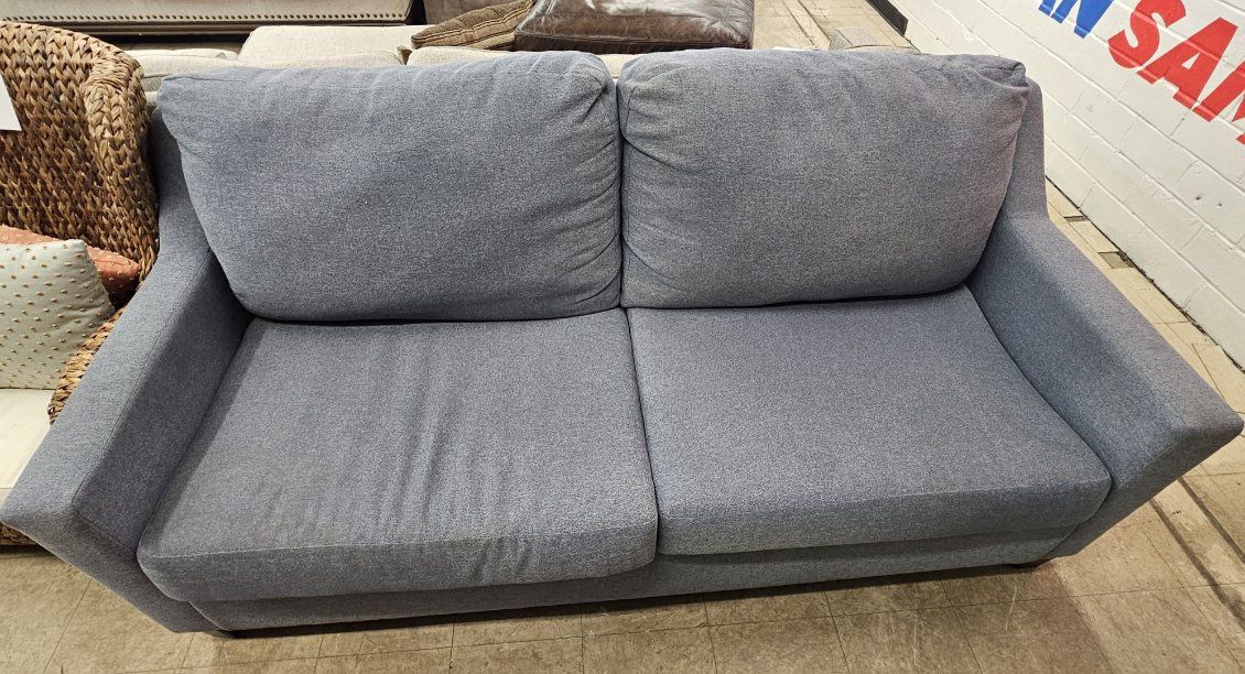 Modern gray loveseat..