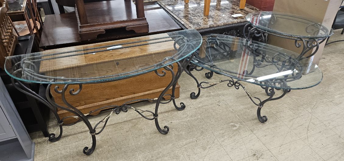 Elegant three-piece glass and wrought iron table set!