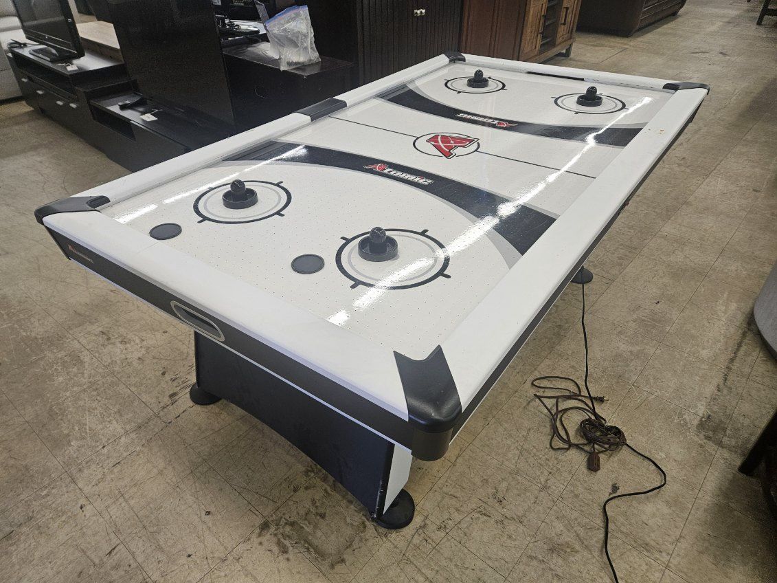 Atomic air hockey table