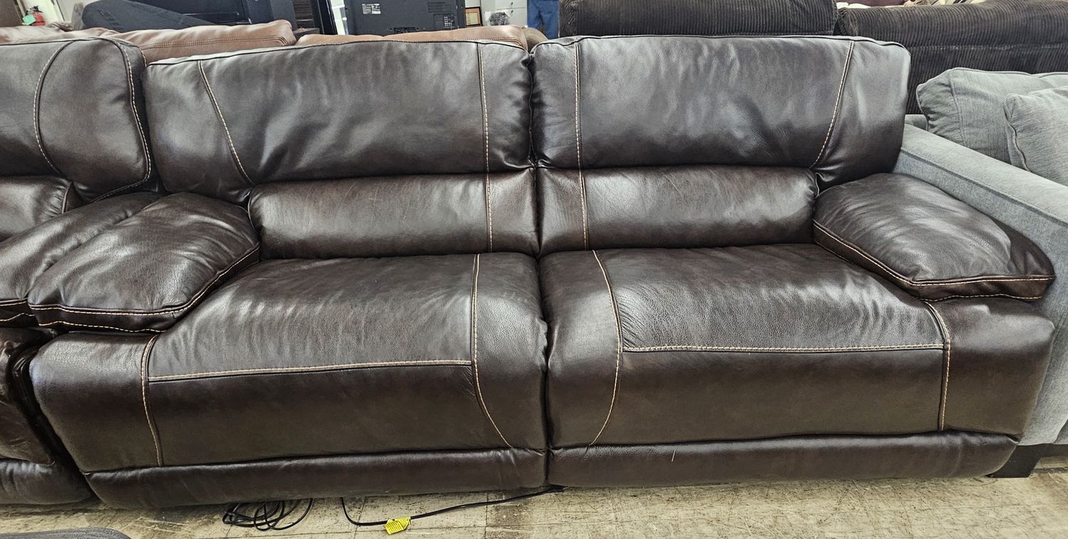 Rich dark brown leather couch and chair set!