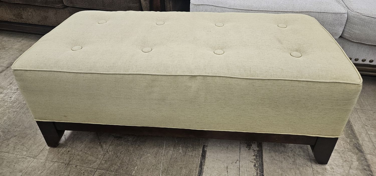 Green upholstered ottoman!
