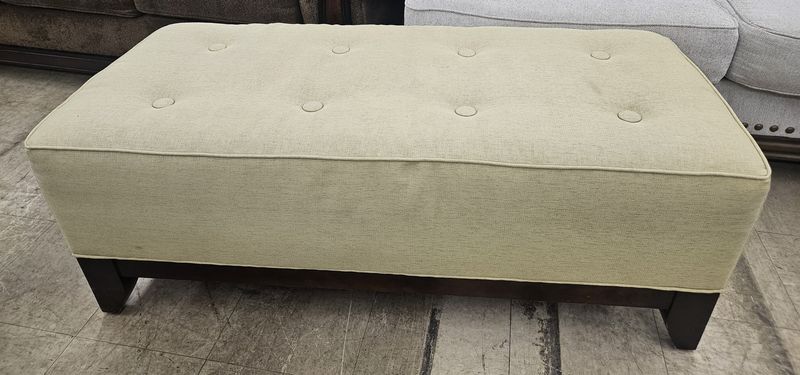 Green upholstered ottoman!