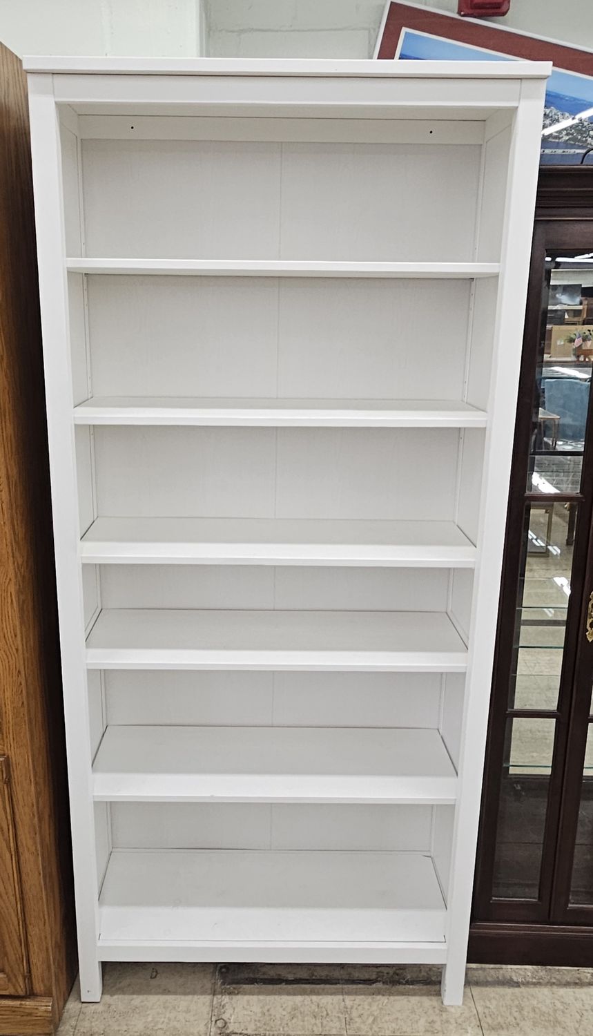 Tall white bookcase