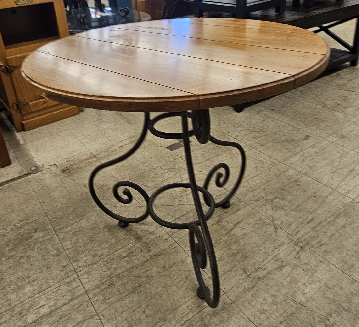 Wood and wrought iron round table!