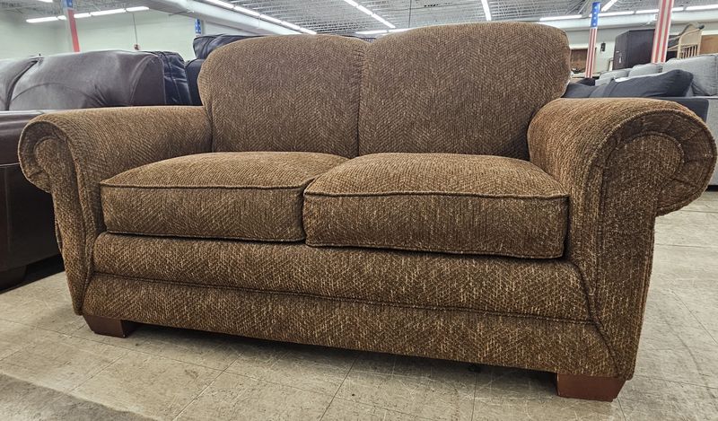 Cozy brown loveseat