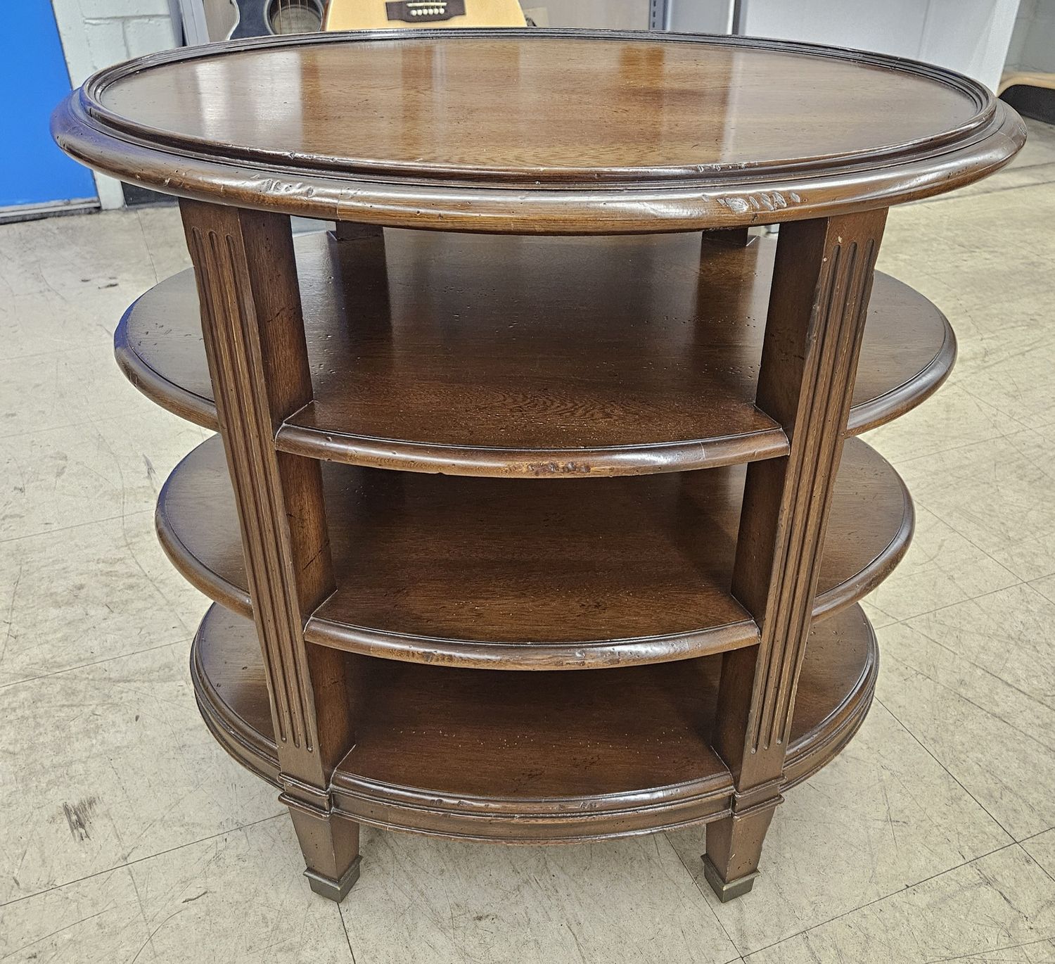 Oval multi-shelf accent table