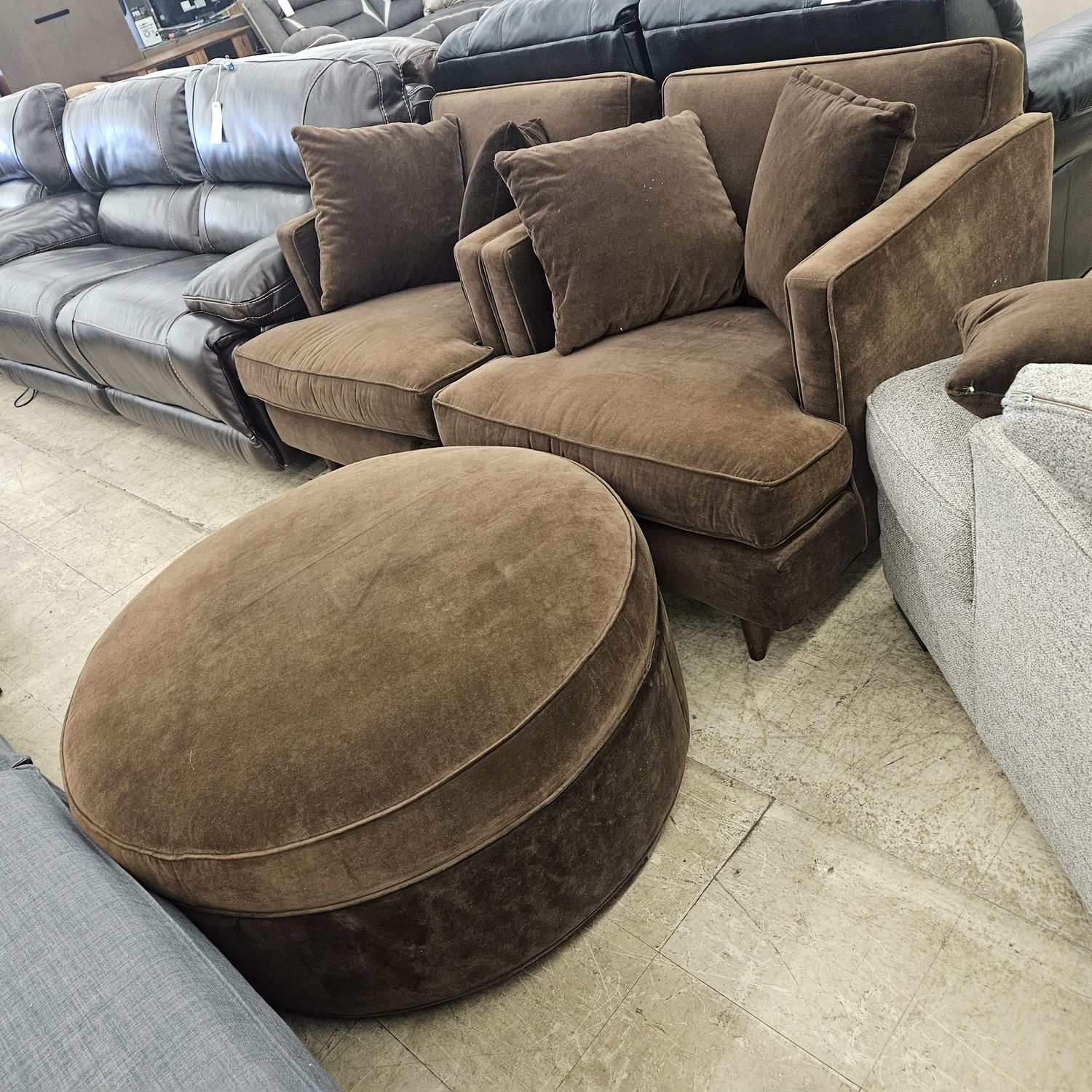 Set of two plush velvet chairs and matching ottoman
