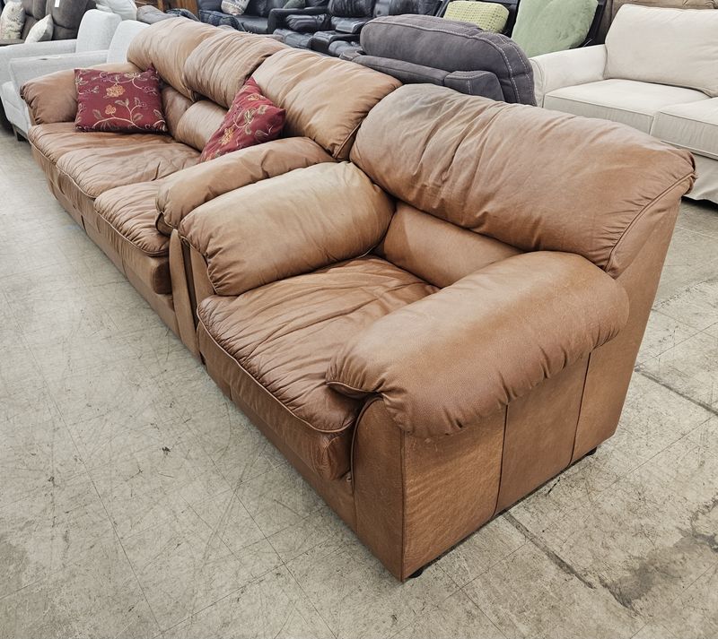 Plush camel-brown sofa and matching armchair set