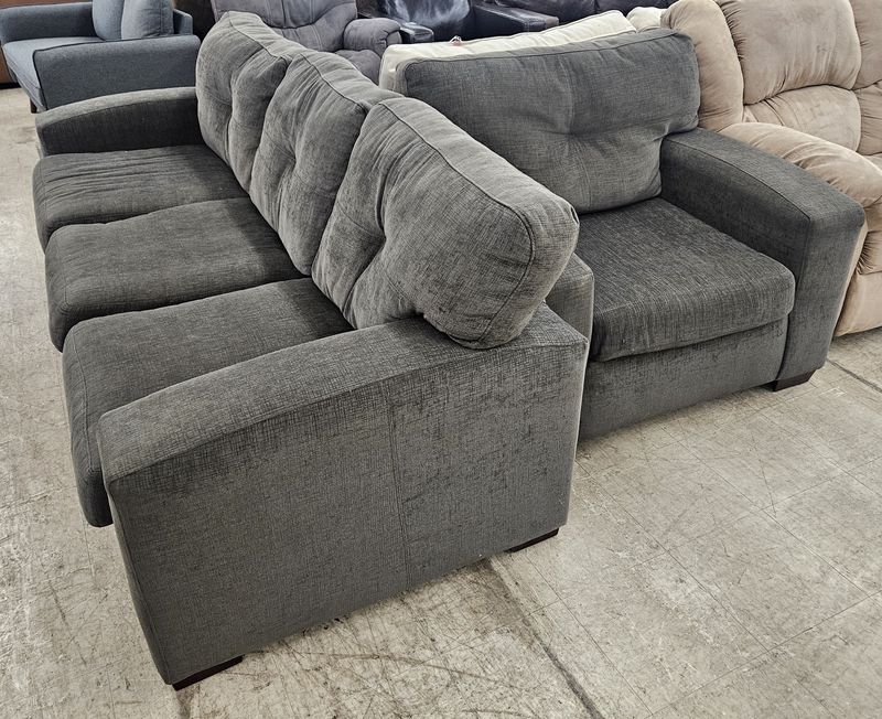 Charcoal gray sofa and oversized chair set