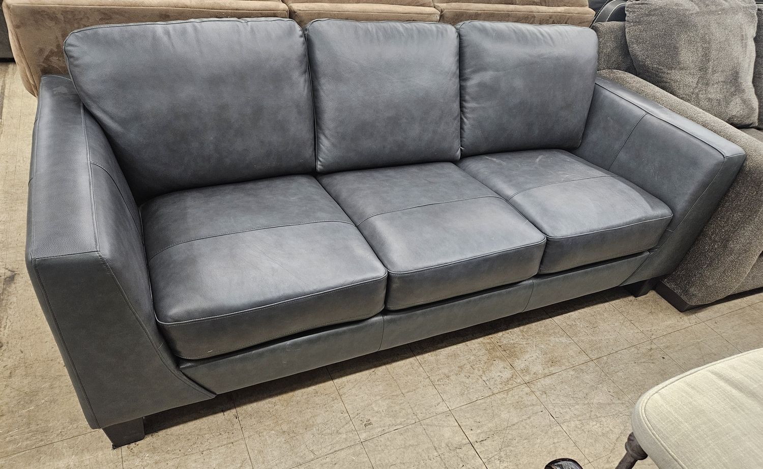 Charcoal gray leather sofa