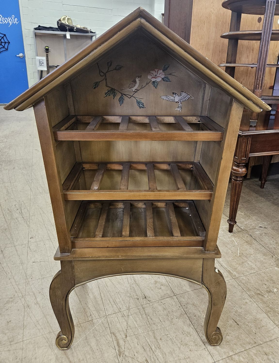 Vintage birdhouse-style wine rack