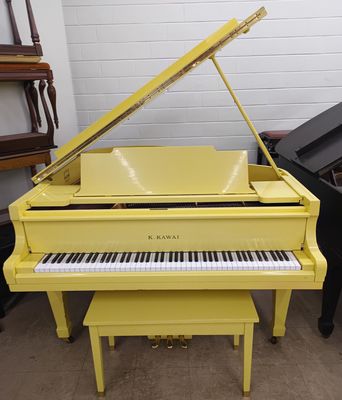 Yellow Kawai Grand Piano