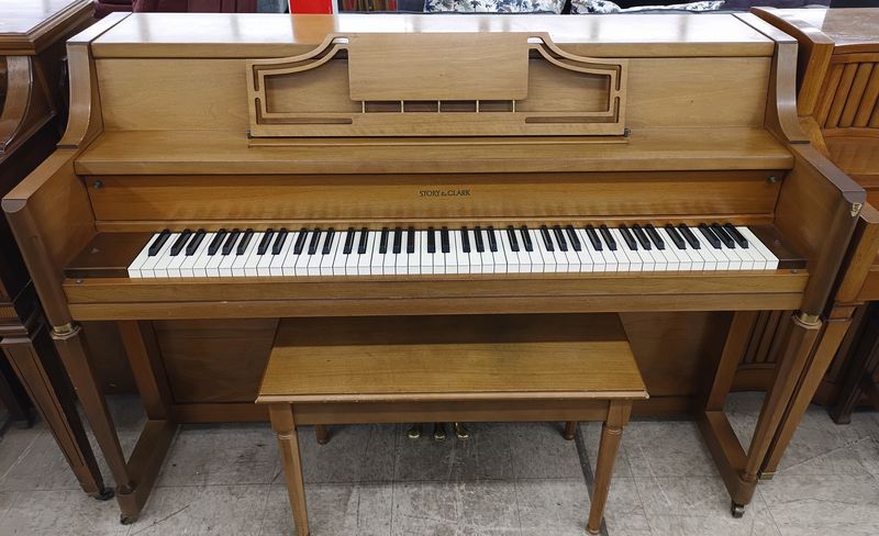 Institutional Story and Clark Console Piano