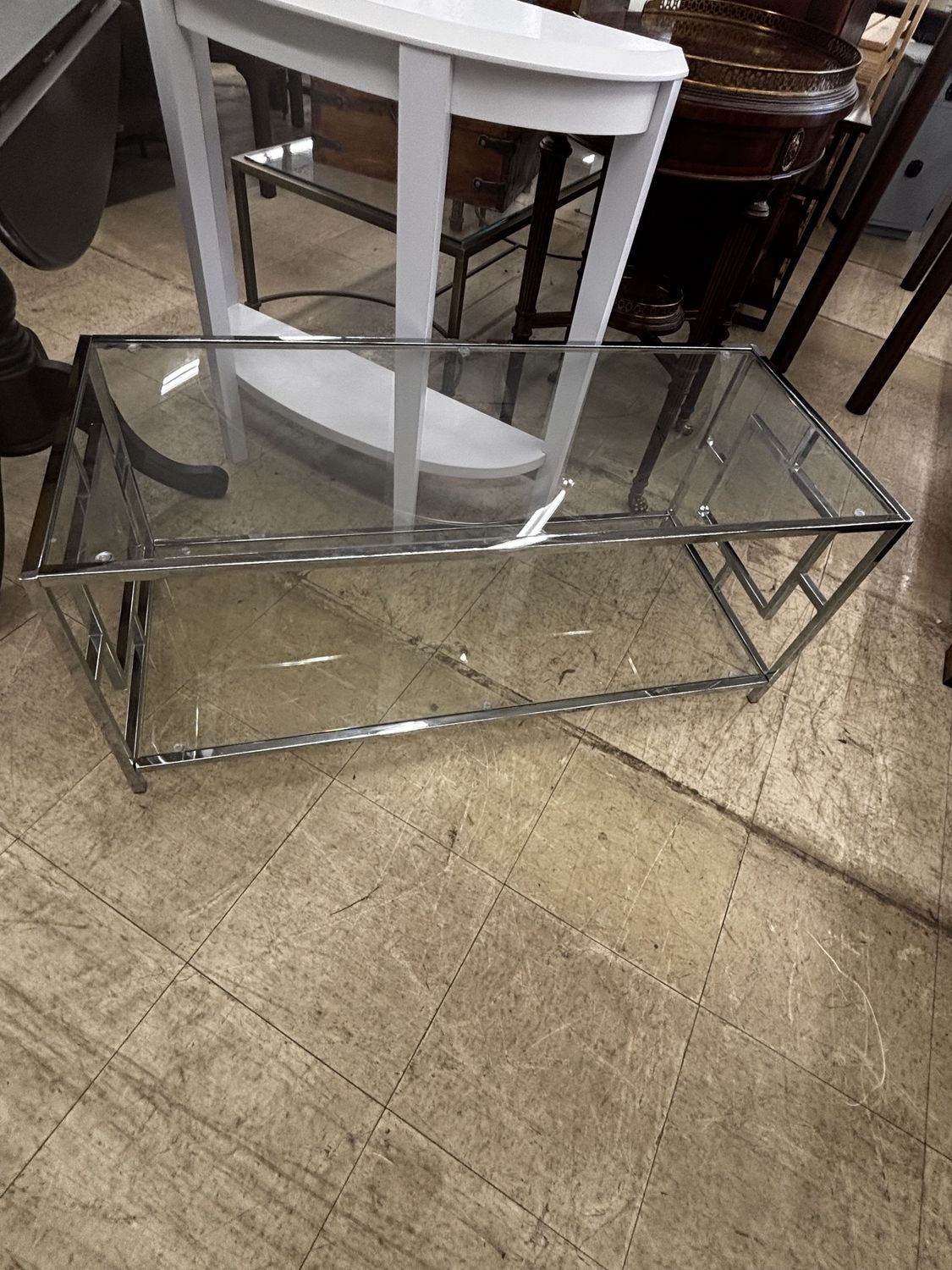 Modern Glass Coffee Table with Chrome Geometric Base