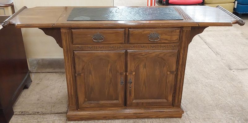 Worldly Entertainment Bar with Leaves