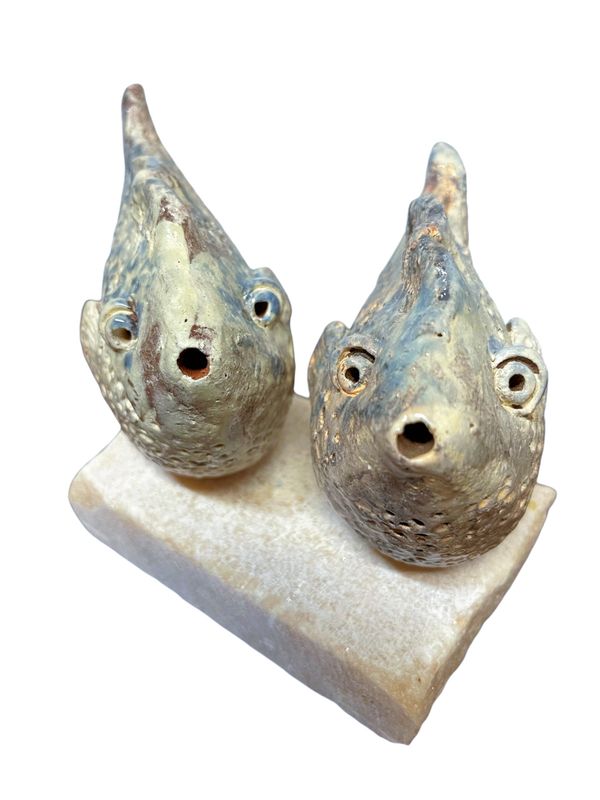 hand made cweamic fish sculptures