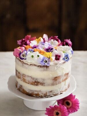 Orange and Almond Layered Cake (fully iced with edible flowers)