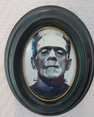 Old frame with photograph of Boris Karloff as Frankenstein
