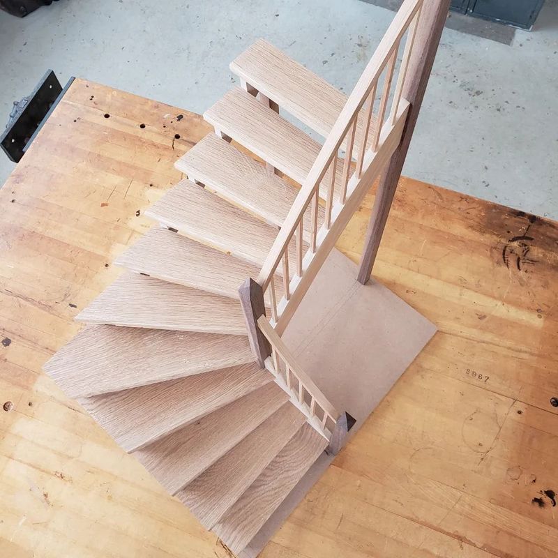 BUILDING ARCHITECTURAL STAIRCASE; A BALANCED QUARTER-TURN WITH DANCING WINDERS