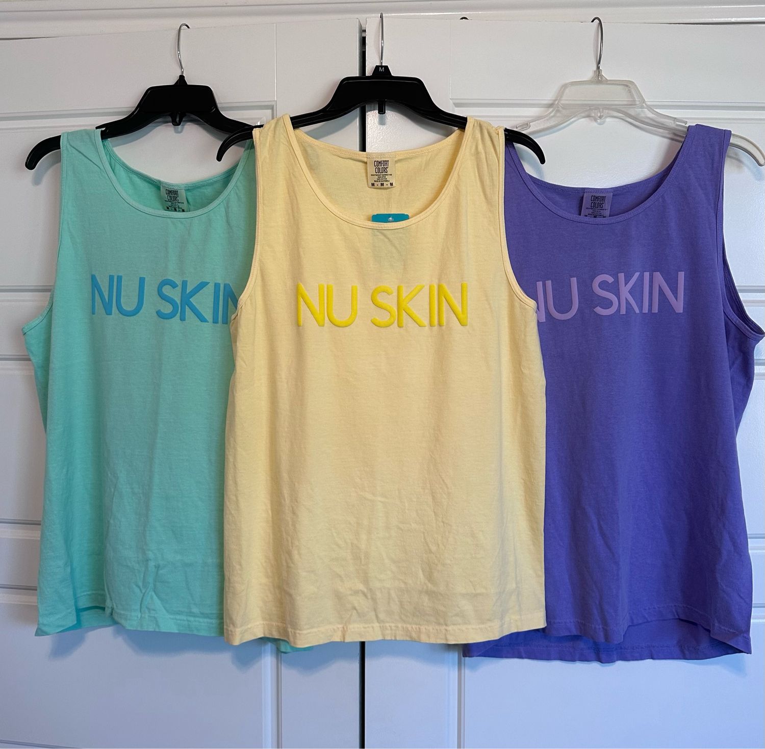 Nu Skin Tank Tops