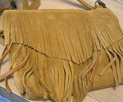 NGOZI Tahiti sling bag