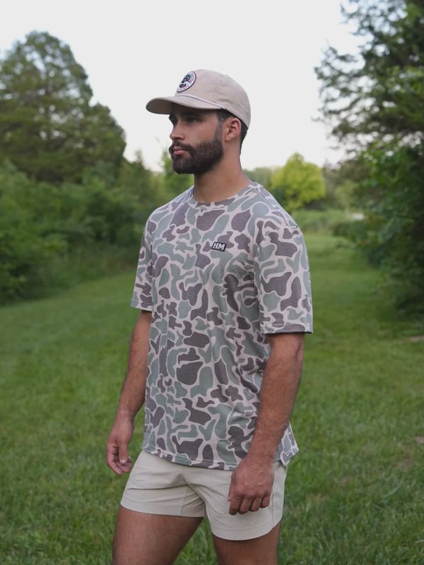 The Marsh Green Camo Migrator Performance Short Sleeve Tee