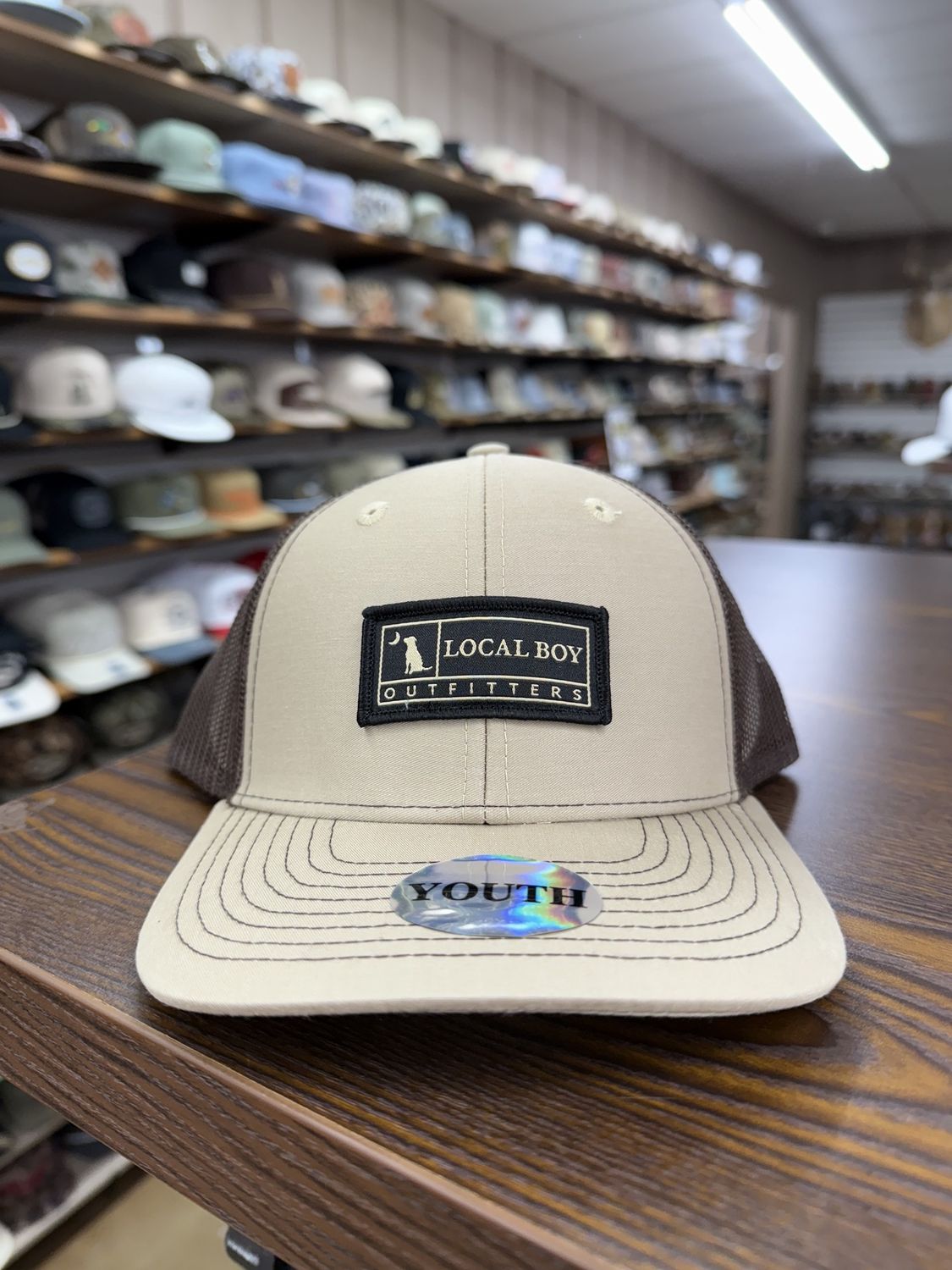 Youth Woven Label Trucker Hat- Khaki/Coffee