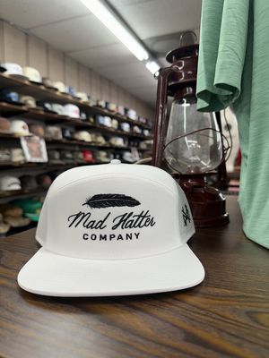 Feather 7  Panel Trucker Hat - White