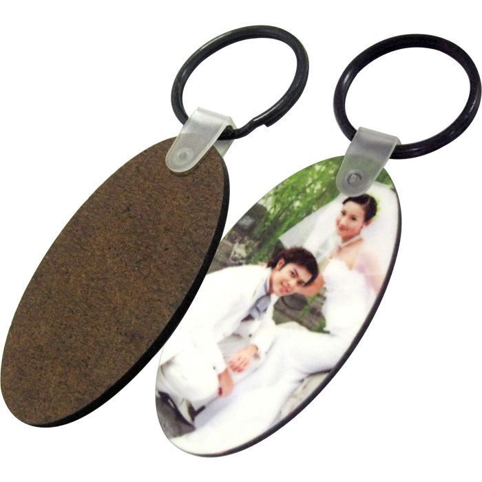deux   porte-clefs en bois forme ovale  PRIX ENTRE 20.00€  à 14.00 €