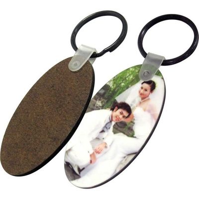 deux   porte-clefs en bois forme ovale  PRIX ENTRE 20.00€  à 14.00 €