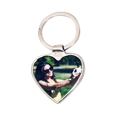 Deux  porte-clés en métal luxe coeur 4 x 3.8 cm  PRIX ENTRE  22.00 e à 15.40 e