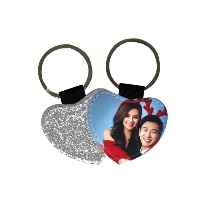 deux porte-clés coeur - recto similicuir sublimable / verso paillette argent  prix entre : 21.00€ à 17.70€
