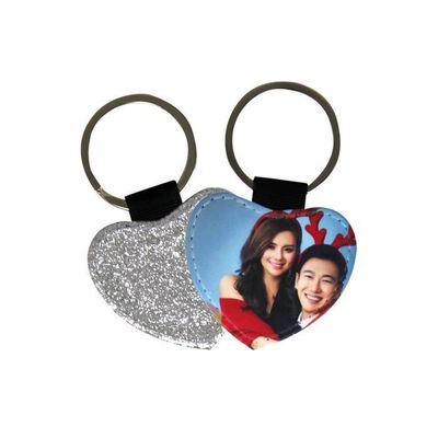 deux porte-clés coeur - recto similicuir sublimable / verso paillette argent  prix entre : 21.00€ à 17.70€