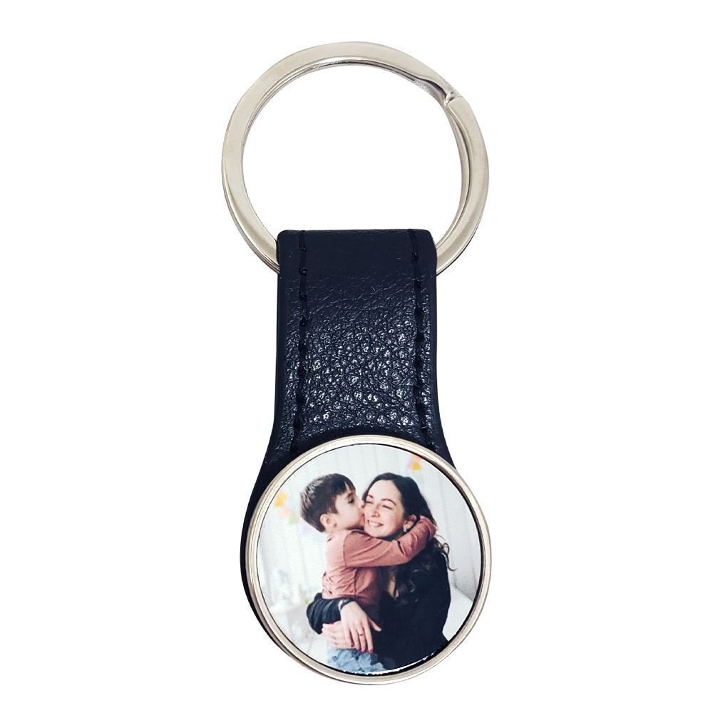 deux porte-clés en similicuir 3 x 5.8 cm avec rond en métal double face sublimable  PRIX ENTRE