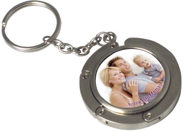 deux porte-clés &quot;accroche sac&quot; argent brillant - forme rond  les tarif entre ; 25.00 € à 17.50 €