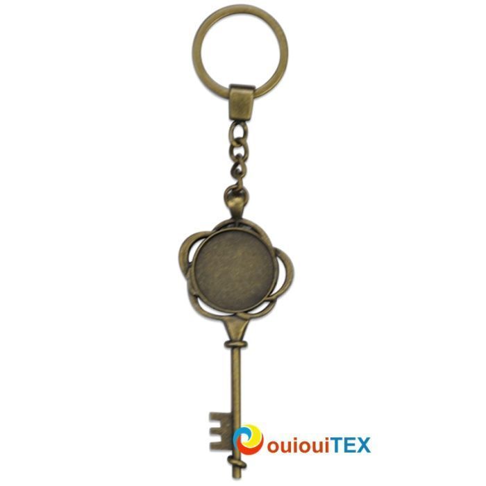 Porte-clés carré en métal bronze avec cabochon en verre    prix entre 20.00€ à 16.00€