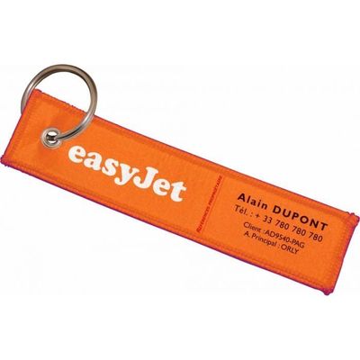 trois porte-clés / étiquettes bagage en tissus 13*3cm   prix entre : 21.00€ à 17.70€