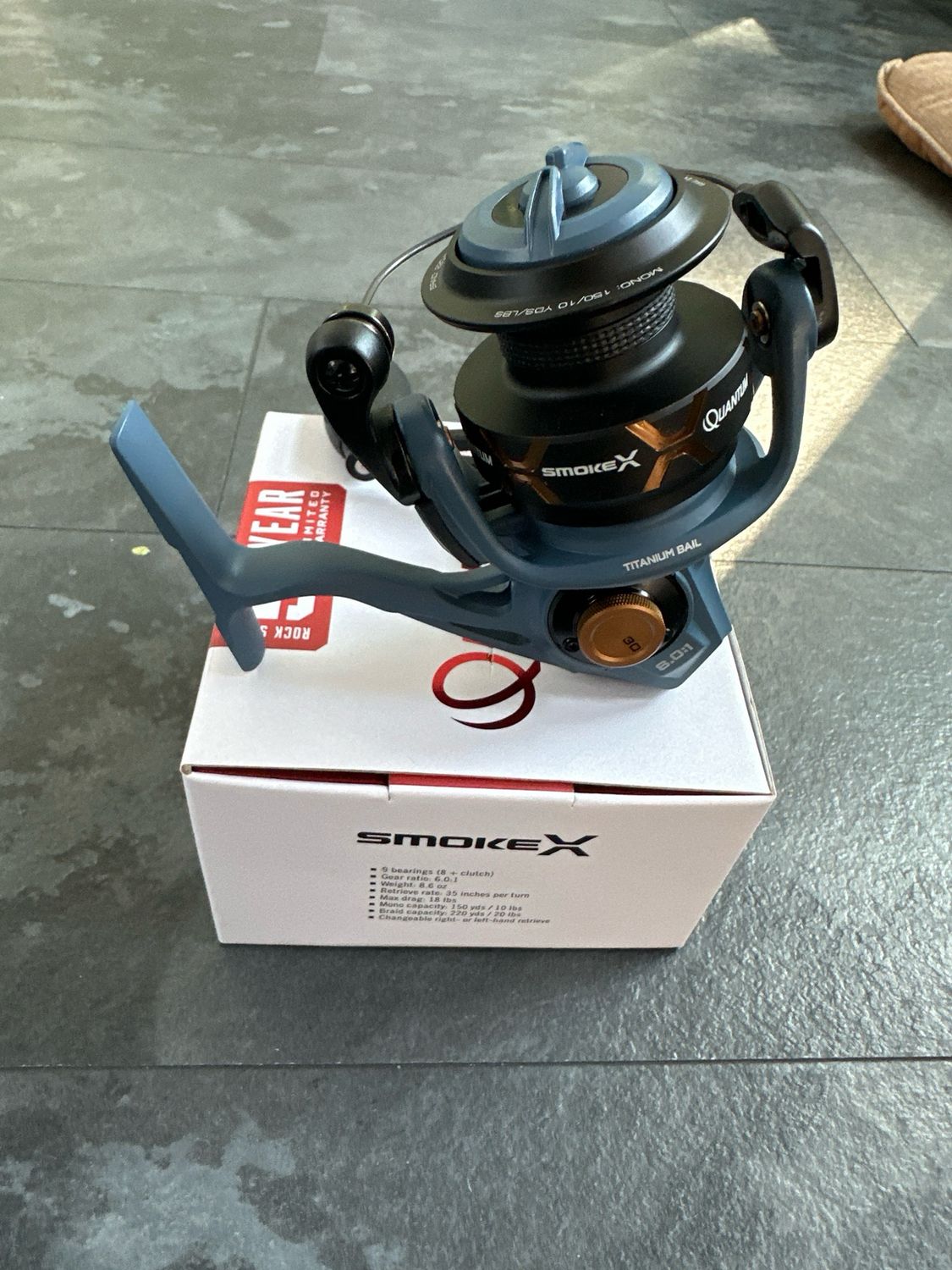Quantum Smoke X Size 30 Spinning Reel. 6.0:1, 9 Bearings, Great Value For The Cost. 18lb Drag. 220yds 20lb Braid Or 150yds 10lb Mono. NIB