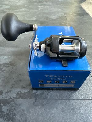 Shimano Tekota 601HG Left Handed Conventional SW Reel. 330yds 65lb Power Pro, 240yds 25lb Mono. New In Box.