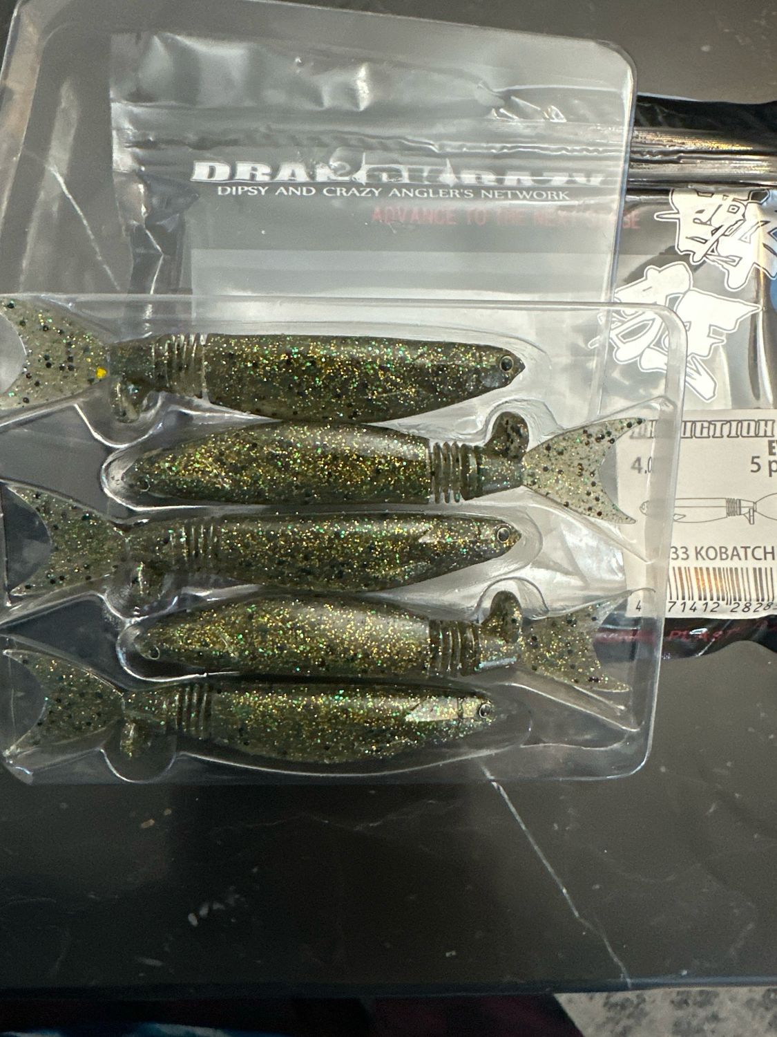 Dranckrazy Induction4Eye Induction 4 Eye. #33 Kobatch. Multi Jointed Tail Section JDM Soft Swimbaits. 5 Baits Per Pack. 4” Per Bait.