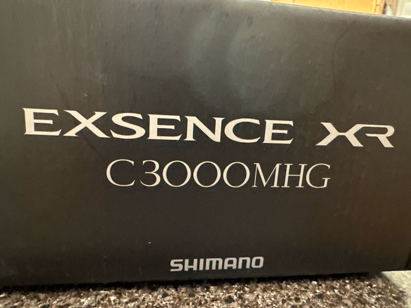 Shimano Exsence XR C3000MHG JDM Spinning Reel MGL. 6.0:1 6.5oz, 20lb Drag, 35IPT. MGL Rotor, New In Box.
