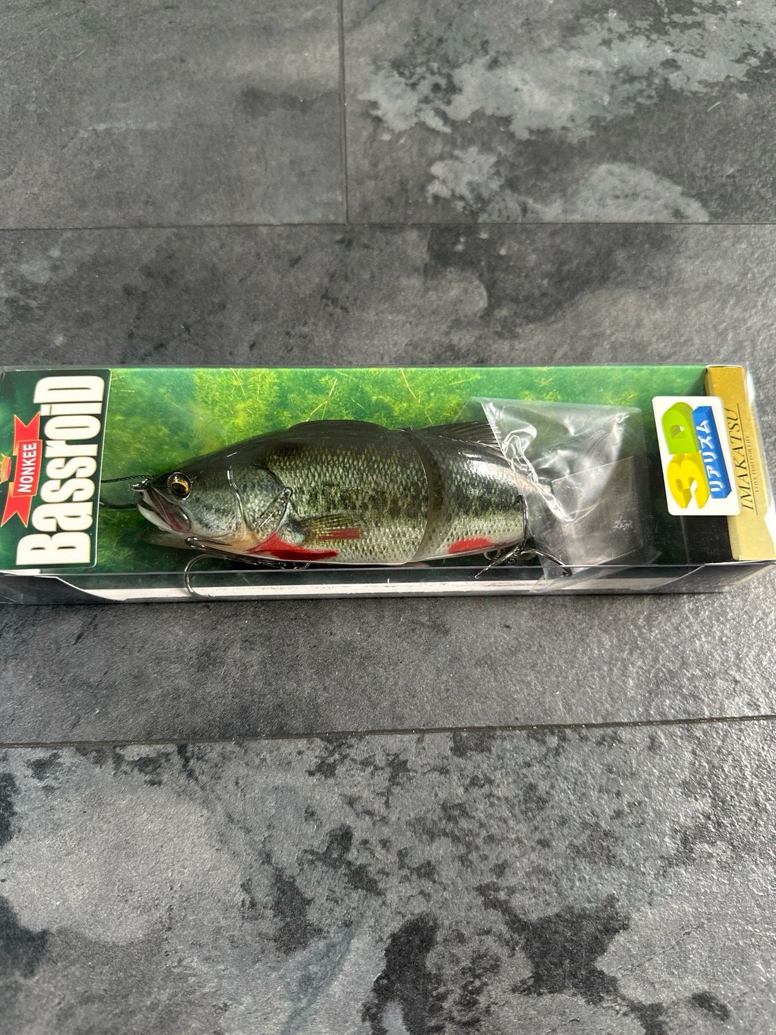 Imakatsu SG Plus Bassroid Nonkee #570 Bleeding Bass. 6.8” 3oz Class. Slow Floating JDM Swimbait. NIB