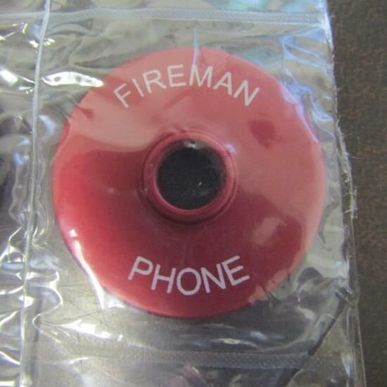 KONE # KM813749H01 BEZEL, FIREMAN, PHONE JACK, RED, WHITE LETTERING