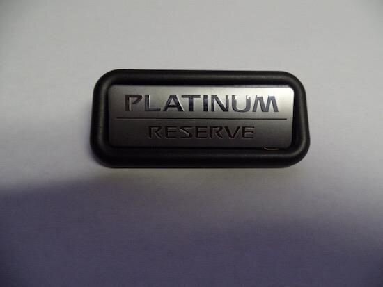NISSAN ARMADA PLATINUM RESERVE SEAT BACK EMBLEM